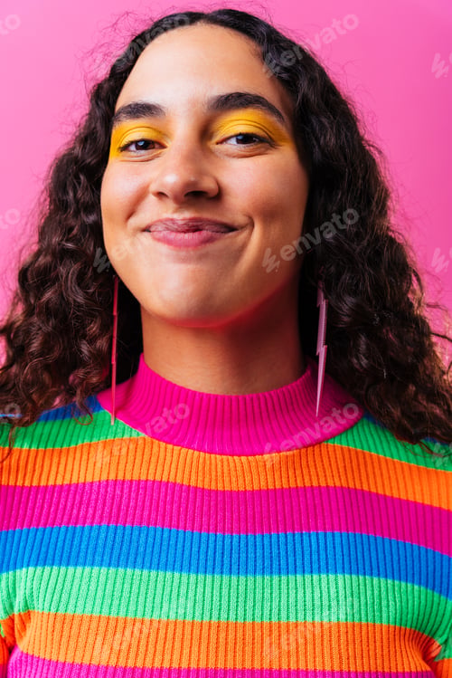 Preview: Creative studio portrait of beautiful hispanic woman with diastema