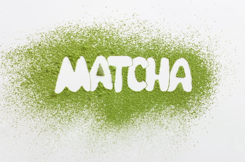 Preview: Matcha word by powdered matcha green tea. healthy drinks concept. energy boosting beverages.