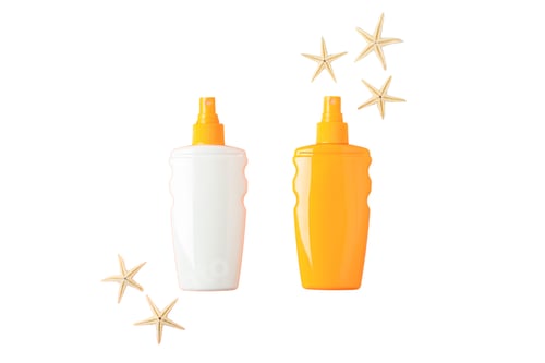 Preview: Sunscreen bottles ready for summer travel and sun protection, isolated on white