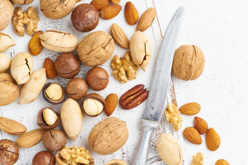 Preview: Mix of nuts - walnut, almonds, pecans, macadamia and knife for opening shell