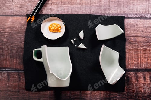 Preview: Kintsugi concept. Broken pottery pieces.