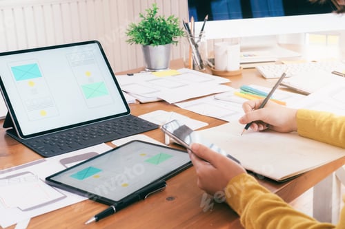 Preview: Computer software developer designing user interface.