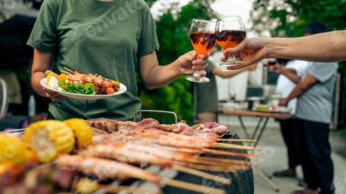 Preview: Home Garden BBQ Party, Wine Glasses Clink in Family Toast, enjoying harvest time together outside at
