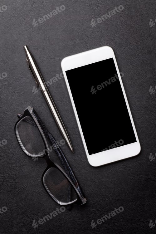 Preview: Smartphone on office workplace table