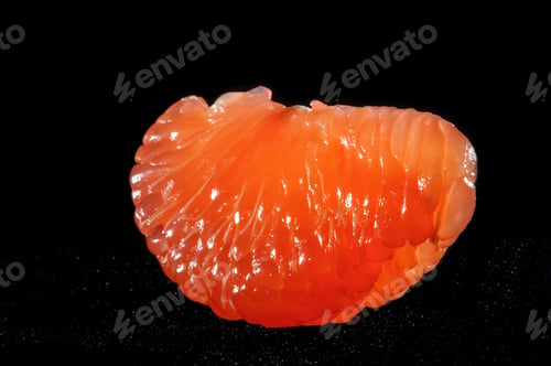 Preview: Close-up orange in the woman's mouth