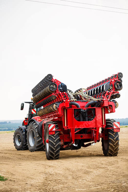 Preview: Large modern tractor for preparing the field after winter for sowing grain. Agricultural machinery