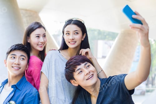 Preview: Young friends taking self portrait with a smart phone