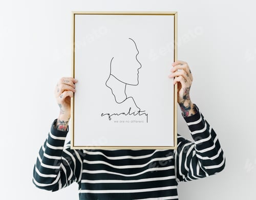 Preview: Tattooed woman holding a photo frame mockup
