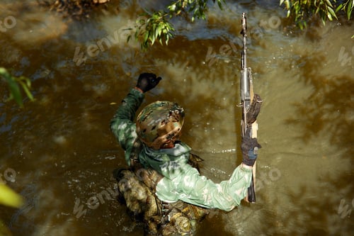 Preview: Full military experience - One day commando - running through the water with automatic rifle replica