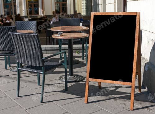 Preview: Empty menu blackboard stand in outdoor cafe