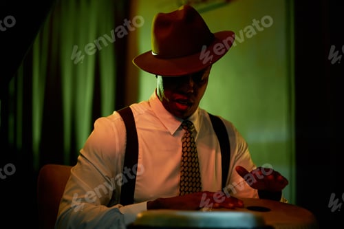 Preview: Black Male Drum Musician in Hat Playing Congas Performing Jazz in Bar