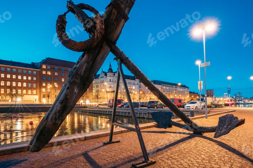 Preview: Helsinki, Finland. Old Anchor On Pier With View Of Pohjoisranta