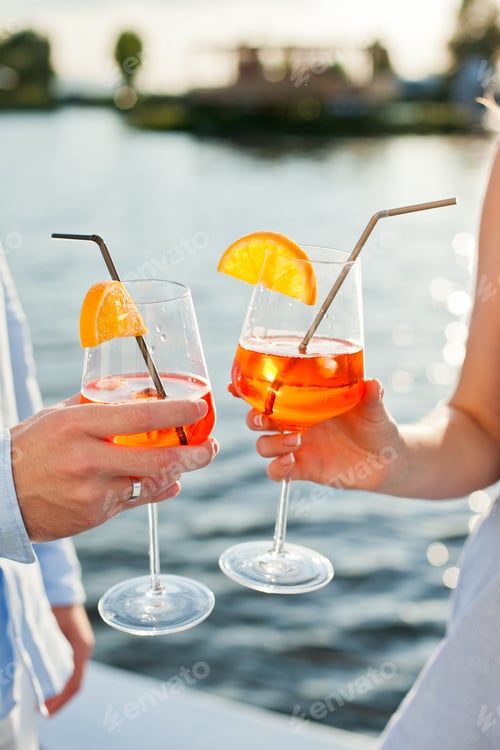 Preview: Colorful drinks, cocktails, happy hour, aperol spritz, enjoying life, relaxing moments,couple,drinks