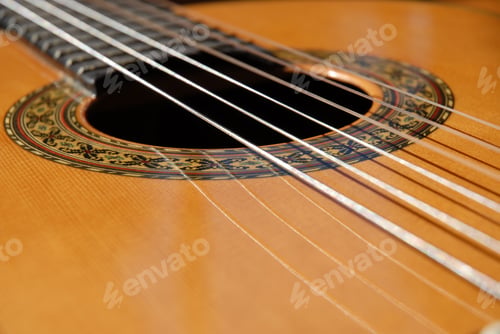 Preview: Classical guitar, sound hole and nylon strings, close up