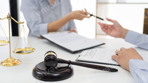 Preview: Professional Secretary lawyer working at his office signing contract Consultation of client from tru