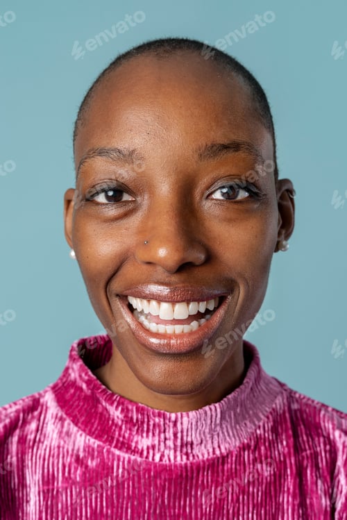 Preview: Happy black woman in a pink top
