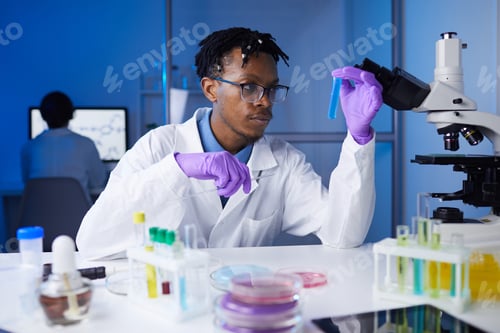 Preview: Young African Man Working in Laboratory