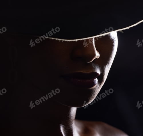 Preview: Woman, dark studio and hat for fashion, beauty and mystery with style, design or closeup headshot.