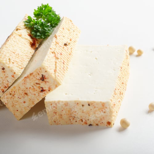 Preview: Soy Bean curd tofu with greens on white background Non-dairy alternative substitute for cheese