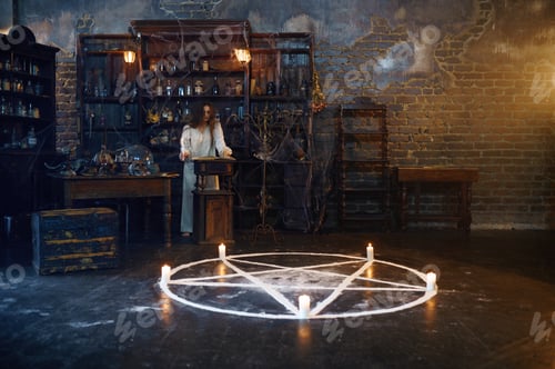 Preview: Young demonic woman reads book of spells
