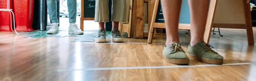 Preview: Unrecognizable people queuing up keeping social distance