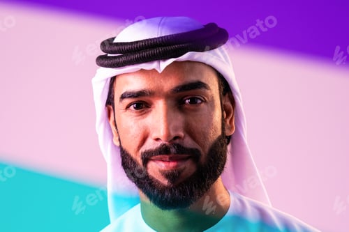 Preview: Arab businessman wearing emirati kandura portrait in studio