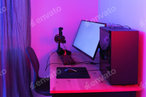 Preview: Gaming personal computer and ultrawide monitor in neon light