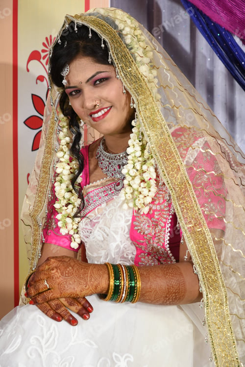 Preview: Indian bride wearing traditional wedding cloths in marriage ceremony.