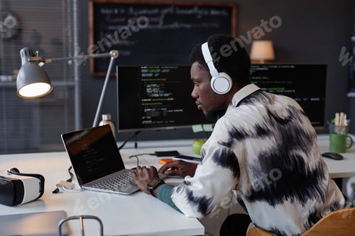 Preview: Programmer developing new program on computer