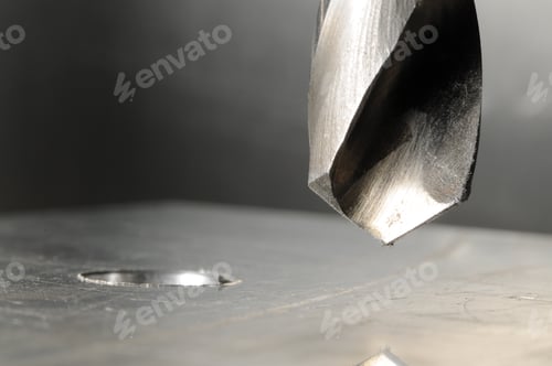 Preview: Metal drill close-up, blurred background