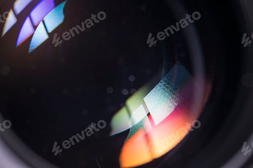 Preview: Close-up of a camera lens with colorful reflections
