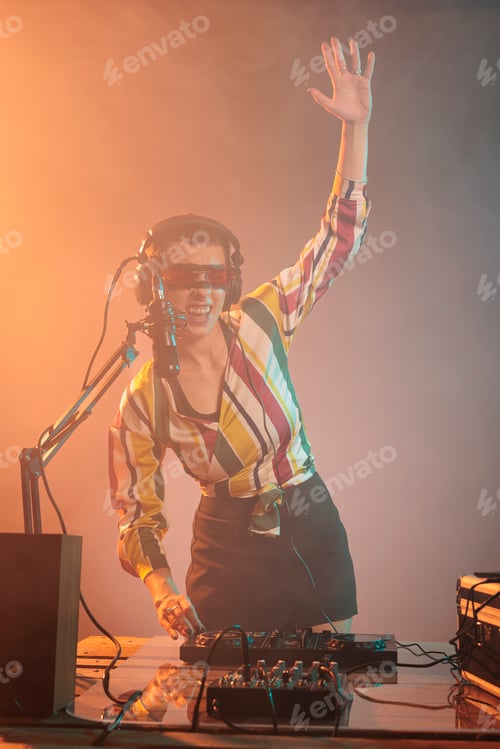 Preview: Cool disc jockey using mixer to play techno