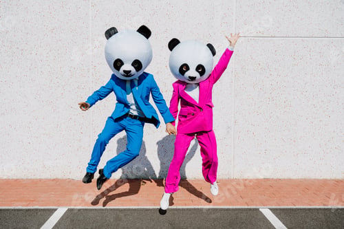 Preview: Storytelling image of a couple wearing giant panda head
