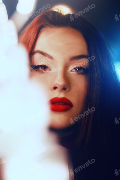 Preview: Portrait of young hot woman posing in studio