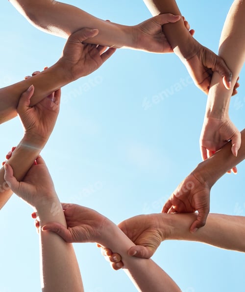 Preview: We are one. Cropped shot of a group of unrecognizable peoples hands.
