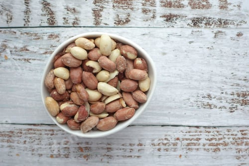 Preview: peeled peanuts in a bowl on table