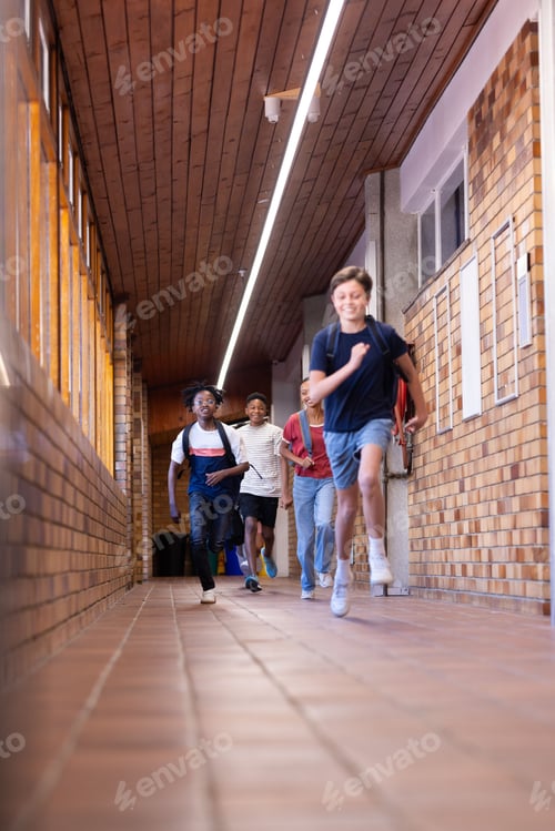 Preview: Running down hallway, group of school children enjoying break time together