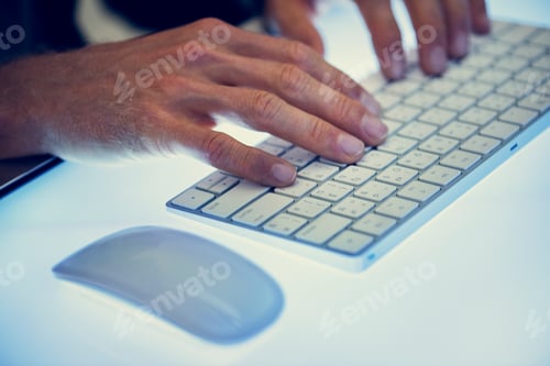 Preview: Hands typing on a keyboard