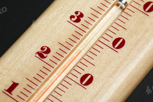 Preview: Weather thermometer on dark background, closeup view