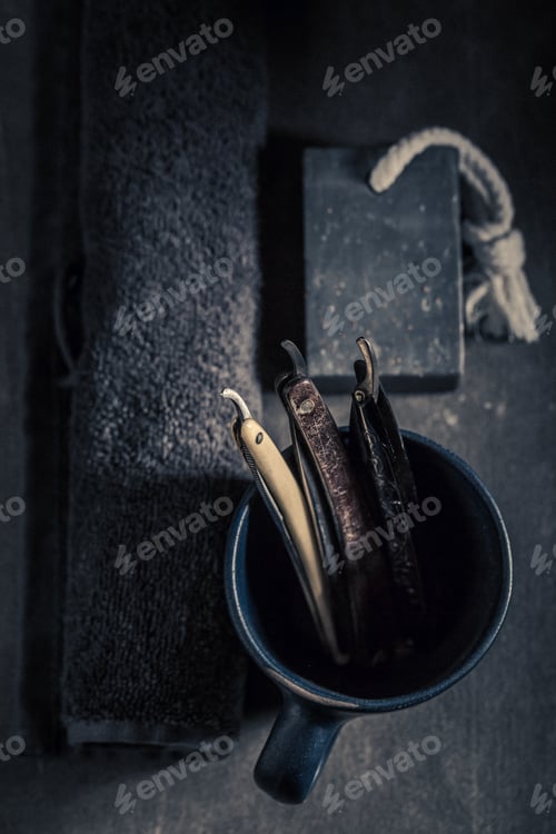 Preview: Unique barber equipment with foam, old razor and brush