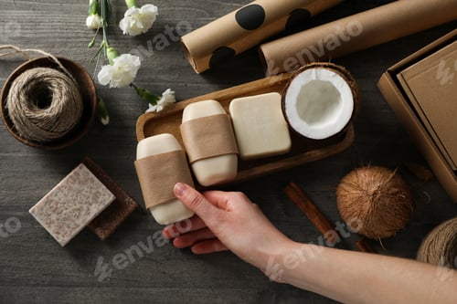 Preview: Natural handmade soap with ingredients, on a dark background.