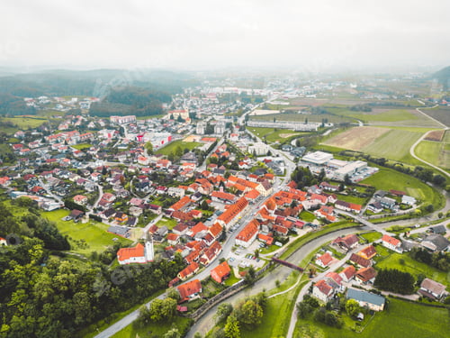 Preview: Aerial view of a small old town with a river running trough