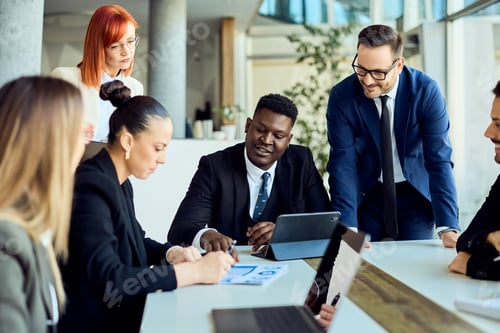 Preview: Diverse Team Collaborating During a Productive Business Meeting in a Modern Office