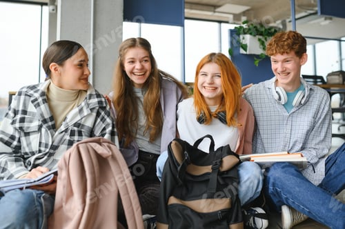 Preview: Happy diverse college students posing for group portrait, looking at camera, smiling