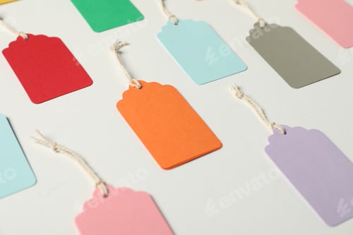 Preview: Blank tags with strings on white background, closeup
