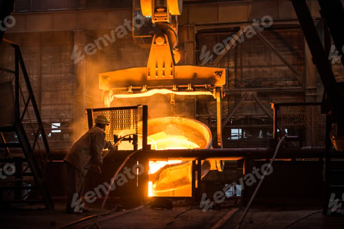 Preview: Steelworker at work near the tanks with hot metal