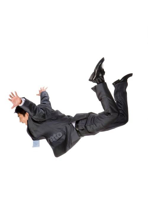 Preview: Young businessman falling down from the sky
