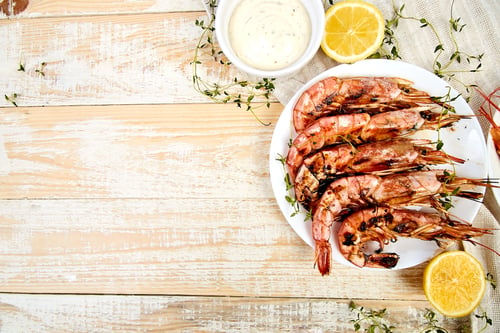 Preview: Grilled big tiger shrimps prawns on white plate