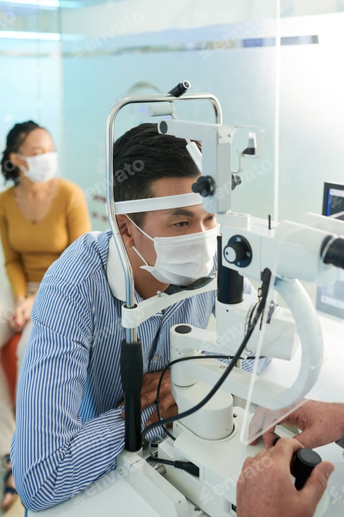 Preview: Man Checking Eyes for Glaucoma
