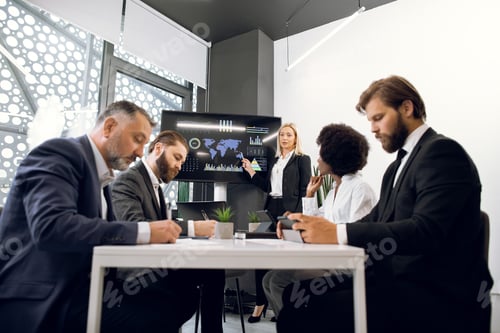 Preview: Business Meeting with Data Presentation at Office